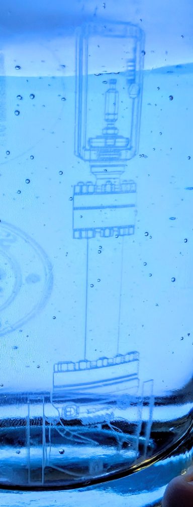 UV-Laser auf Glasflasche